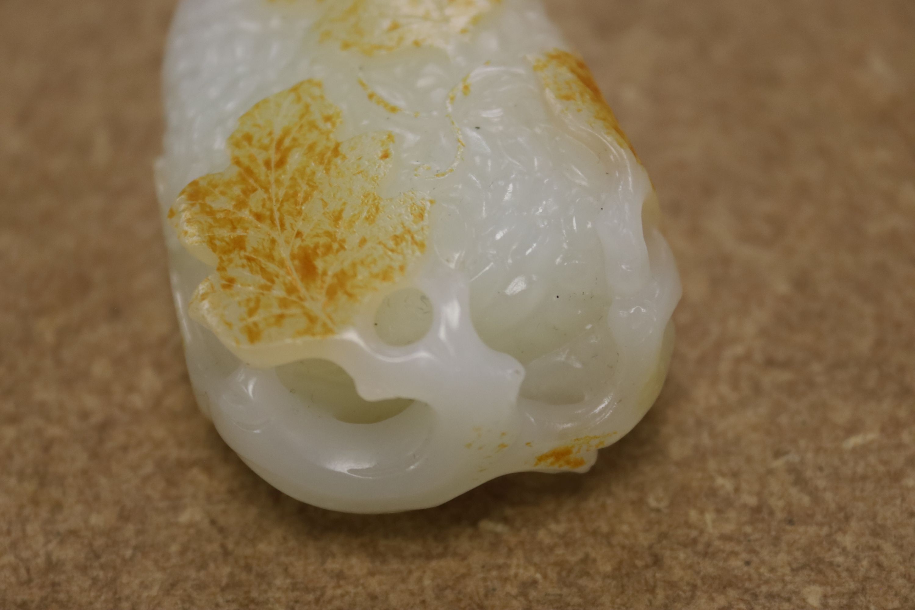 A Chinese white and russet skin jade carving, 7cm high